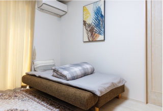 Sofa bed with bedding